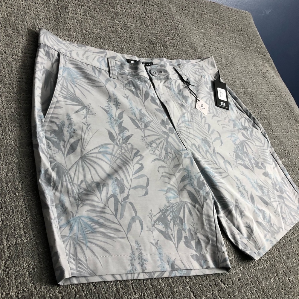 Travis Mathew Light Gray Floral Print Shorts with Subtle Blue Accents